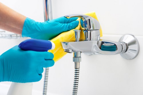 Trained technician cleaning carpet with professional care